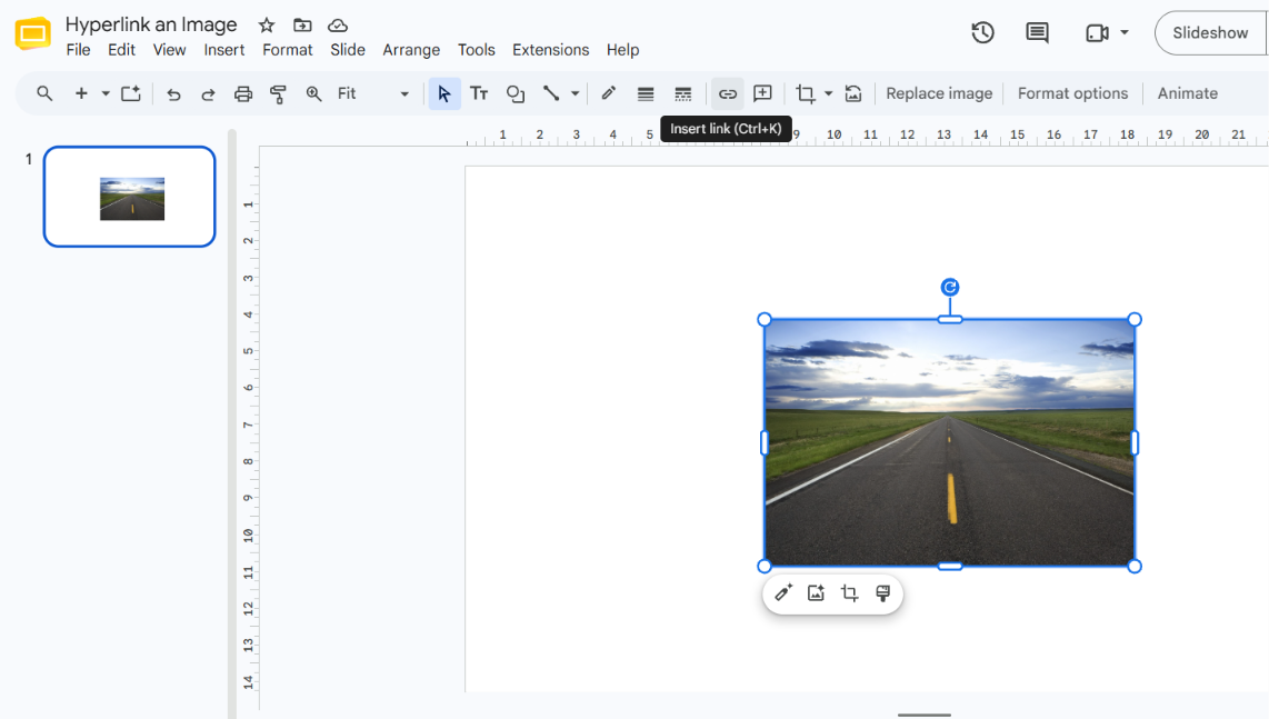 Google Slides editor with an image selected and the Insert link button highlighted in the toolbar